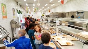 The school lunch program provides 3 million meals to military children overseas including these students at Netzaberg Elementary School, Germany. 