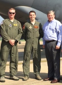 Director/CEO Tom Shull stands with Airmen at Barksdale AFB, La.