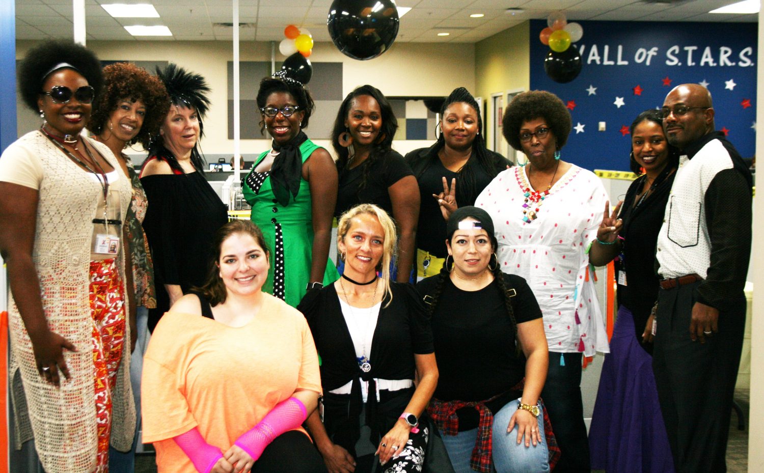 Every day is a different dress up day for associates in the the contact centers. Pictured is Decade Day.