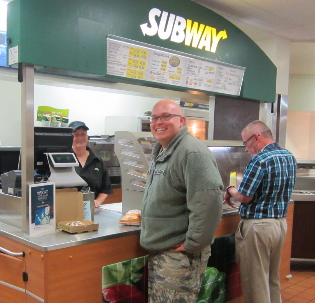 Cheyenne Mountain Air Force Station customers enjoy lunch at the Exchange Subway cart.