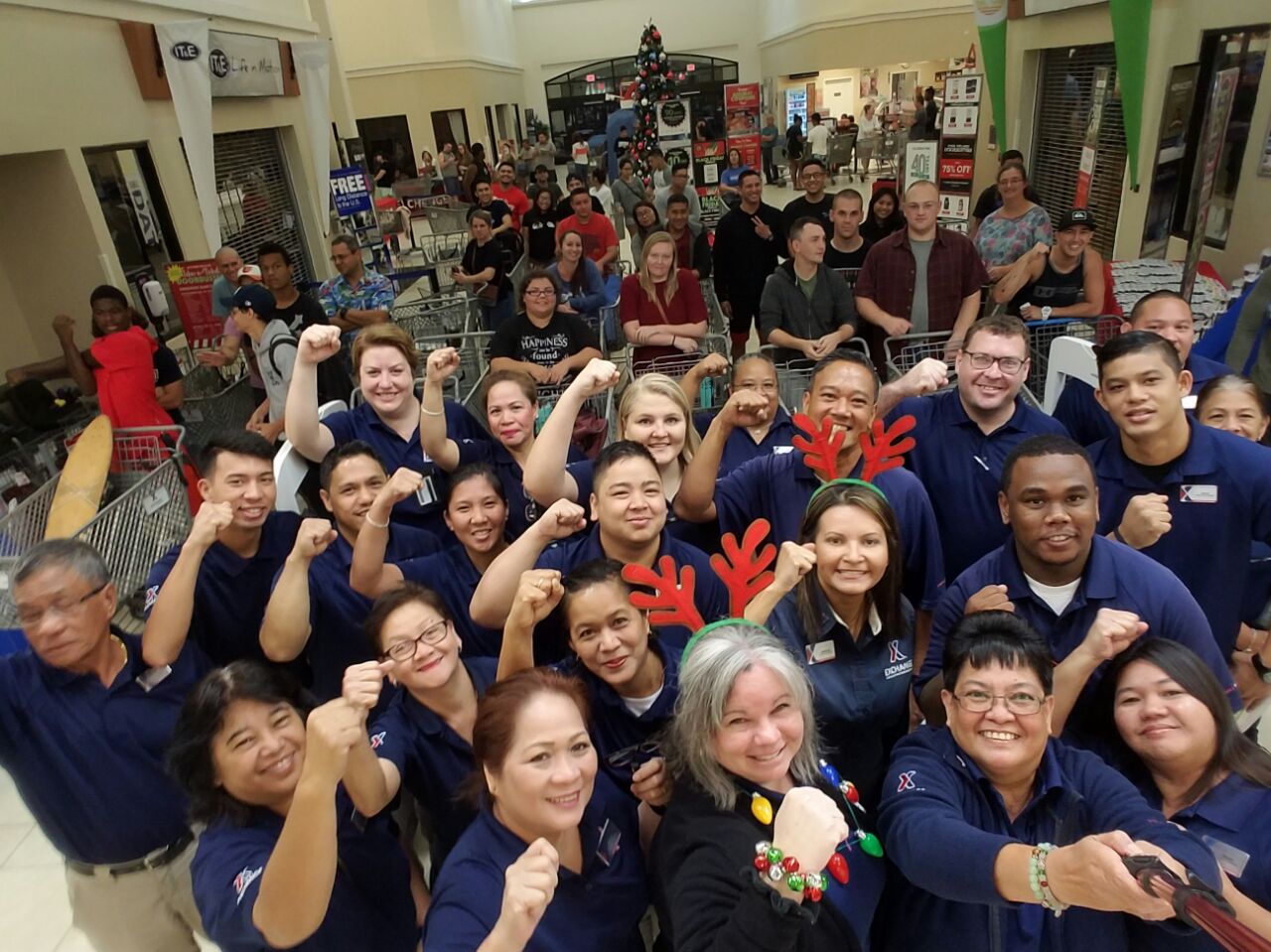 Anderson AFB associates snap a selfie before the doors open.