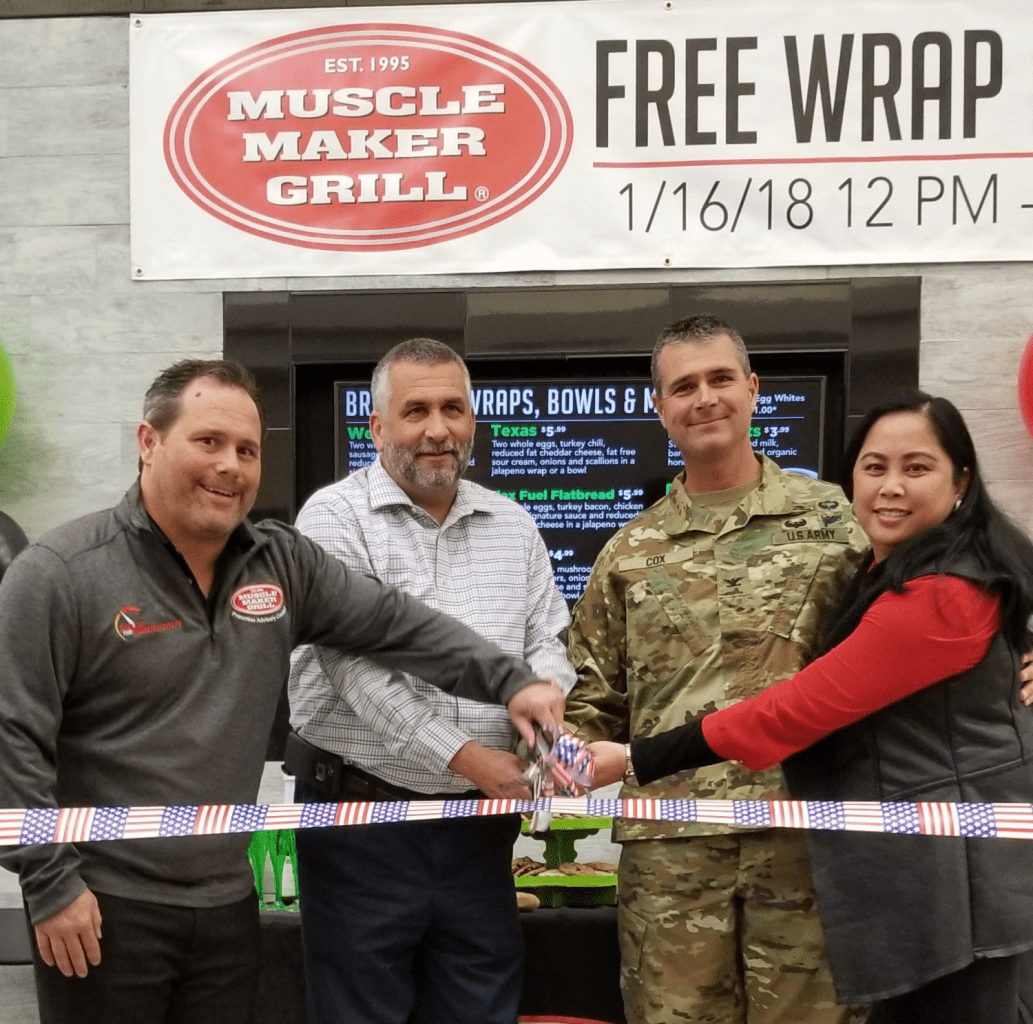 Ribbon-cutting ceremony: Left to right: Mark Farmer, Muscle Maker Grill vice president of operations; Don Sydlik, Exchange general manager; Col. Clinton Cox, Fort Benning garrison commander; and Rutchel Williams, Exchange services business manager.