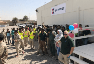 A crowd of shoppers gather outside the new Exchange at Union III in Iraq.