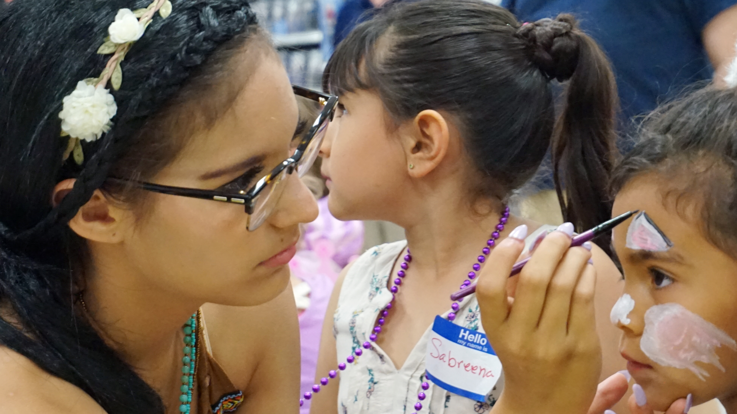 LUKE AFB, Ariz. - A child gets her face painted at a Month of the Military Child event.