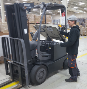 Germersheim DC's Rafael Trzmiel is caught working safely by conducting his daily inspections using his checklist to ensure the equipment is working properly.