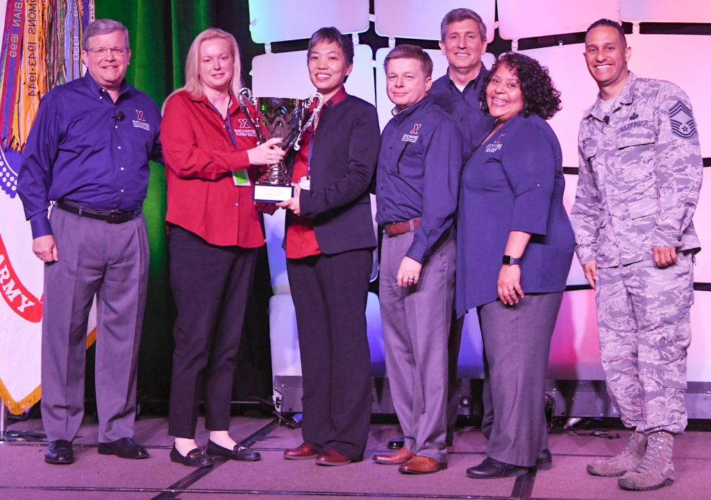 Robins/Moody Exchange was awarded the Director/CEO Cup in the Medium category at the Main Store Managers/General Managers Conference. Pictured (left to right): Exchange Director/CEO Tom Shull; Robins/Moody Exchange General Manager Stephanie Wilson; Robins Exchange Main Store Manager Keola Chan; Chief Operating Officer Dave Nelson; Chief Administrative Officer Phil Stevens; President Ana Middleton; and Chief Master Sgt. Luis Reyes.