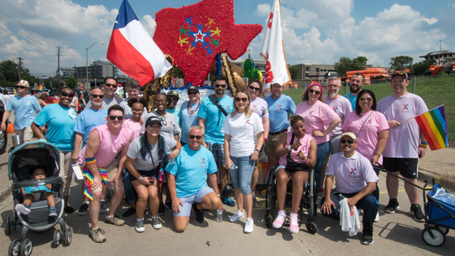 HQ associates and their allies pose for a picture at the Dallas PRIDE parade Sept. 16.