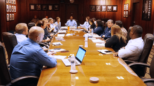 Exchange Director/CEO Tom Shull, center, right, and senior managers talk about how to best serve Warfighters and their families caught in Hurricane Florence.