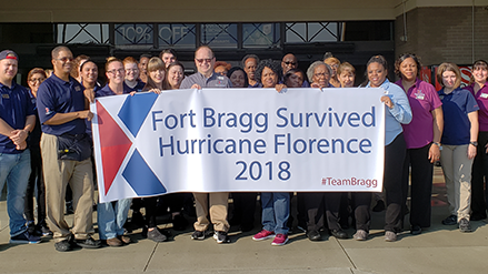 Associates celebrate the reopening of their South Post main store at Fort Bragg.