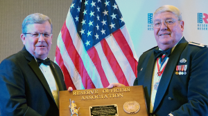 Exchange Director/CEO Tom Shull, left, became the 98th member inducted into the Reserve Officers Association Minuteman Hall of Fame on Sept. 29 at ROA’s national convention in Omaha. Mr. Shull accepted the award from ROA President Donald Stockton, a retired Air Force Reserve lieutenant colonel, on behalf of the worldwide Exchange team's collective efforts to care for America’s citizen-warriors, their families, retirees and Veterans.