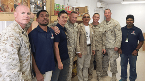 COL John Armellino, commander of the 8th Marine Regiment, center, and his leaders pose with associate Naresh Sethi, and Azamat Narynekov, Exchange Afghanistan GM Robin Chetri, and associate Mustak Ahamed.