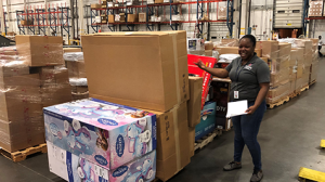 Dan Daniel DC Logistics Operations Manager Alecia Barrett checks one of the first shipments staged for UPS pick up.