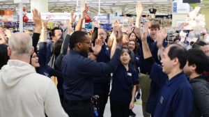 Exchange managers and associates at Japan's Yokota AB get revved up for Black Friday weekend.