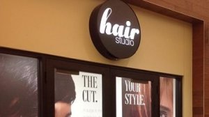 Hair Studio store front and sign.