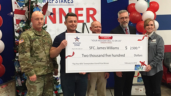 Left to right, Garrison Command Sgt. Maj. William D. Lohmeyer, SFC James Williams, Fort Bragg General Manager Bill Shoffner, Exchange Executive Vice President and Chief Financial Officer Jim Jordan, and Store Manager Trish Jones.