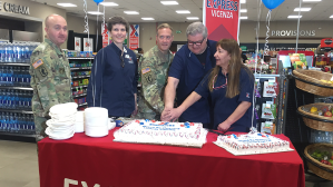 Command Sergeant Major Mason Bryant, General Manager Cindy Brown, Col. Eric Berdy, retired Express associate Tony Tognoni, and Store Manager Sema Trost open the new Express at the Army garrison in Italy.