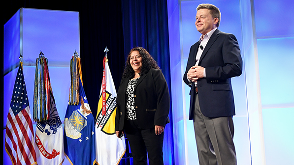 President and Chief Merchandising Officer Ana Middleton and Chief Operating Officer Dave Nelson get ready to present awards to exemplary Exchange