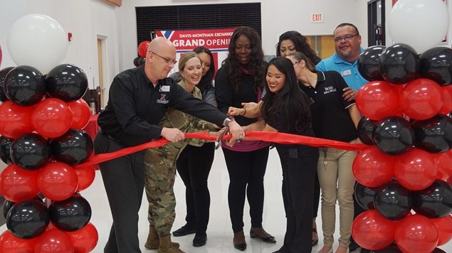 Exchange GM Mikel Hunter, left and 355th Mission Support Group Commander Col. Julie Newlin join associates and concessionaires to open a new durable medical equipment store.