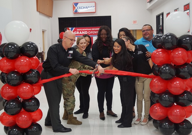 Exchange GM Mikel Hunter, left and 355th Mission Support Group Commander Col. Julie Newlin join associates and concessionaires to open a new durable medical equipment store.