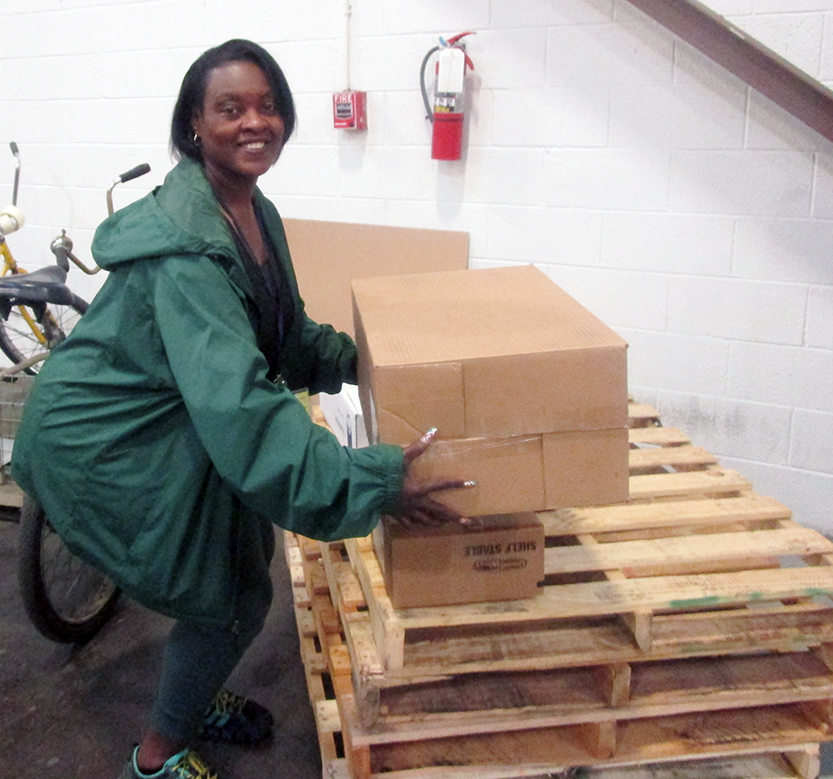 Safe-working challenges motivate associates like Patricia Becton to learn proper techniques, improve the distribution center's efficiency and reinforce physical and cognitive fitness.