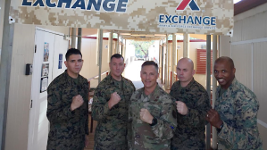 Pacific Pride in Australia! Exchange Pacific Region Commander Col Scott Maskery, center, presents his Commander’s Coin to U.S. Marines running the mobile field exchange at Camp Robertson Barracks. From left to right: SGT Angel Mendoza, GySgt Jonah Thomas, MGySgt Christof Coleman and CWO4 Montreal Newkirk.