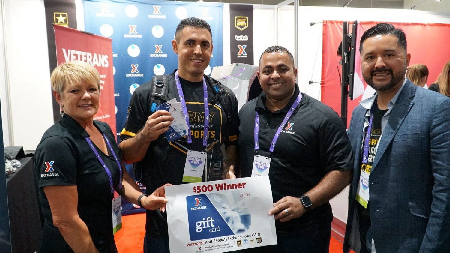 Sgt. Dominic Ramirez took home the grand prize Sept. 27 at TwitchCon after battling against fellow Soldiers and Guard members during a "Street Fighter 5" competition. Ramirez, assigned to the Presidio of Monterey, won a $500 Army & Air Force Exchange Service gift card and a Gaemz prize package. From left: Sandi Lute, Exchange vice president for marketing and customer engagement; Ramirez; Jose Hernandez, Exchange veterans service organization/military service organization outreach manager; and Refugio Orozco, Army MWR sponsorship coordinator