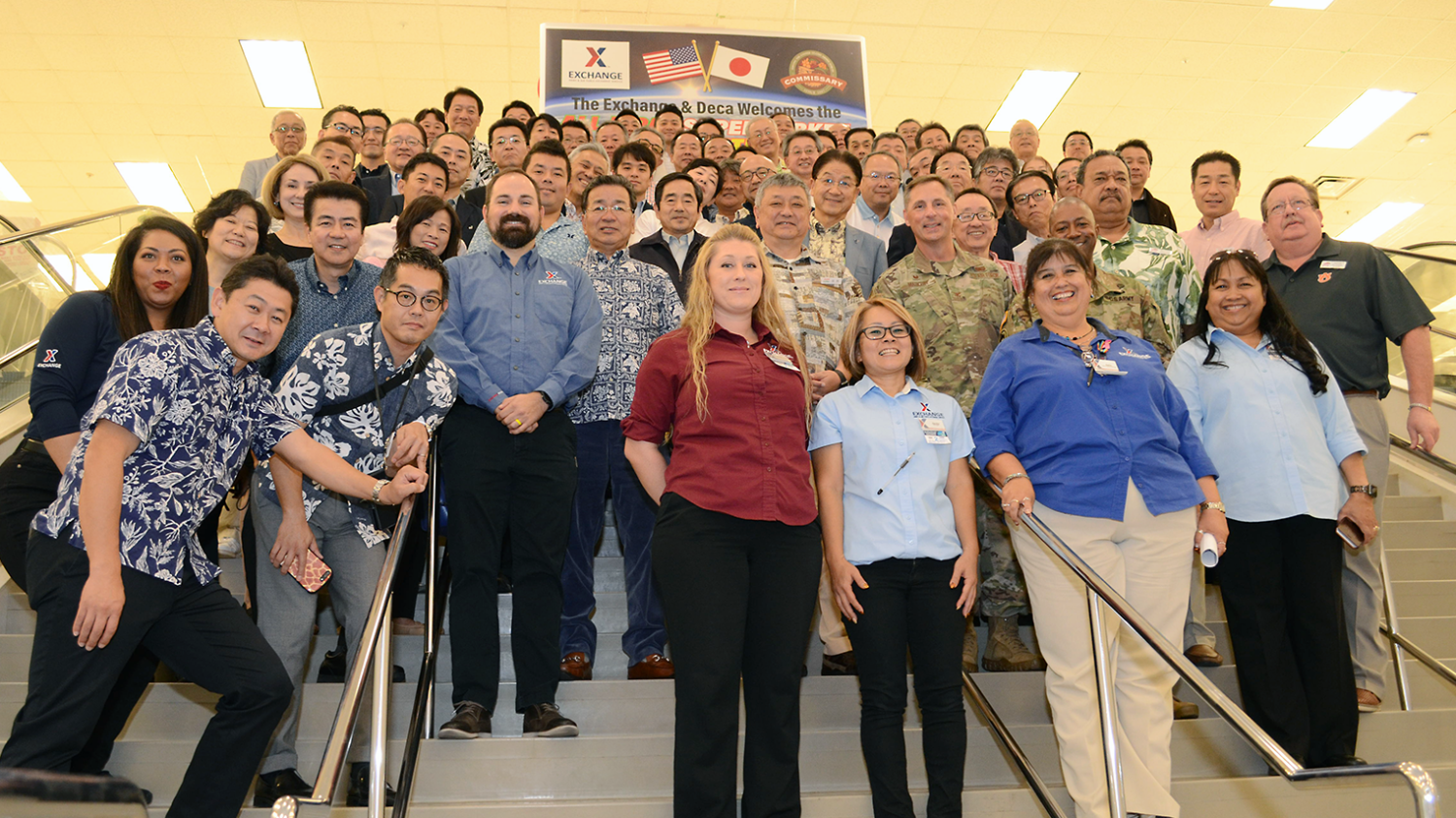 Leaders of the All-Japan Supermarket Association,  Exchange and commissary gather for a picture in Kadena AB's Exchange.