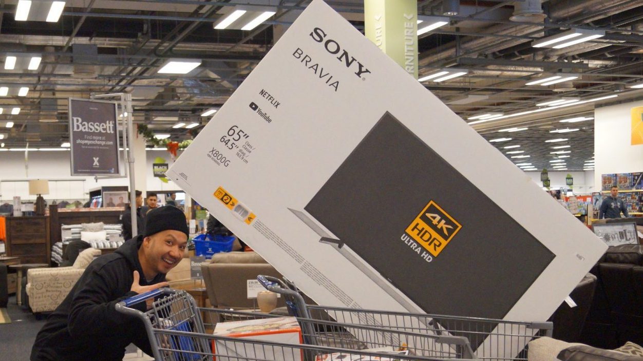 A shopper at the Kaiserslautern Military Community Center Exchange is excited after finding exactly what he wanted on Black Friday 2019.