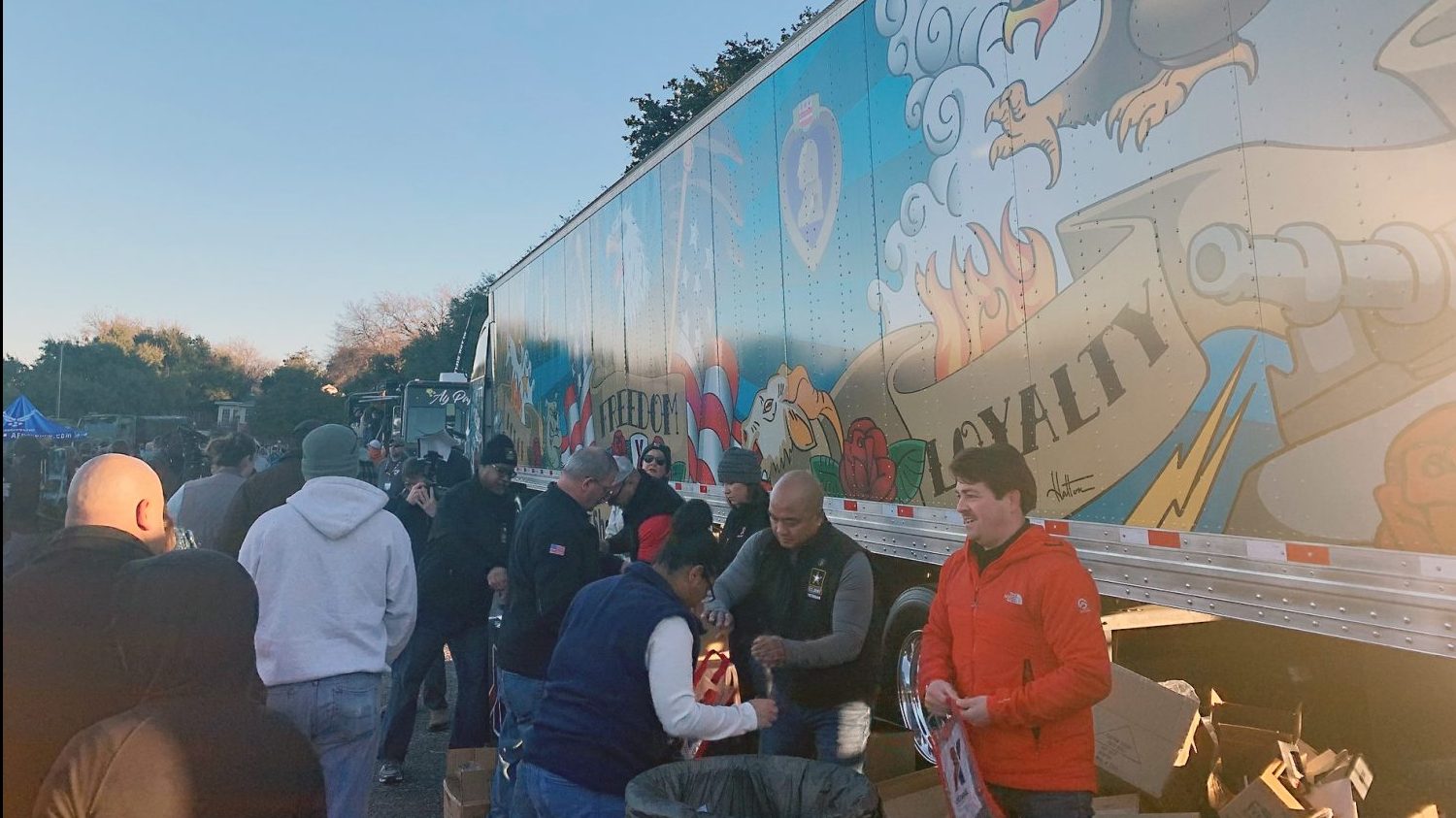 Before kickoff, fans picked up giveaways and took photos of the Exchange’s new truck design, which features Americana-style artwork by Air Force and Marine Corps Veterans who work at the Exchange.