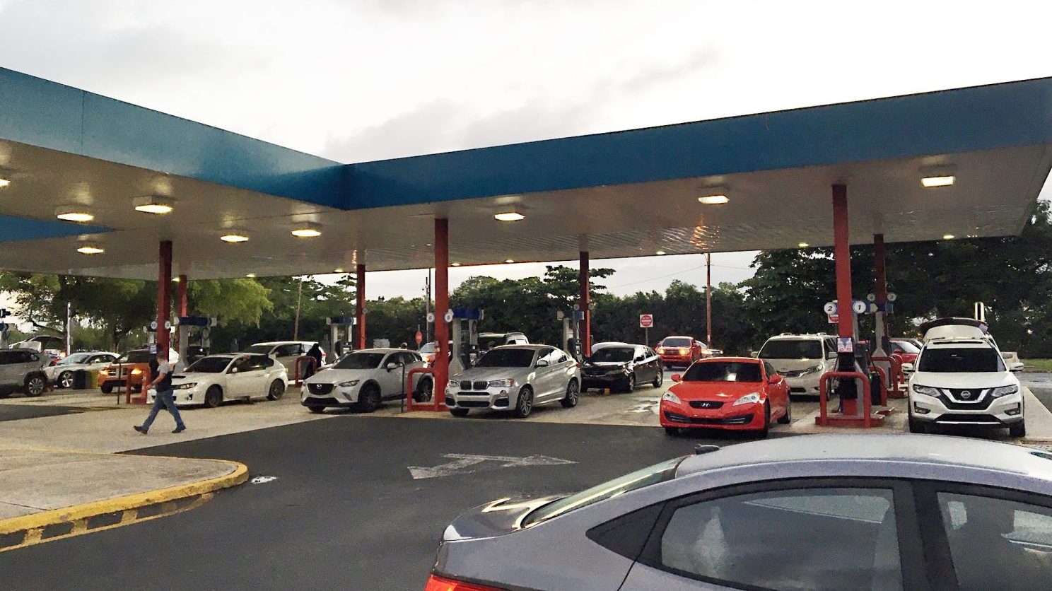 Drivers queue up to the Exchange gas pumps for fuel on the day the earthquake struck.