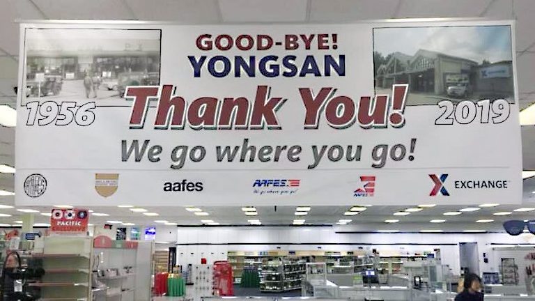 Associates tell their customers goodbye at Yongsan.