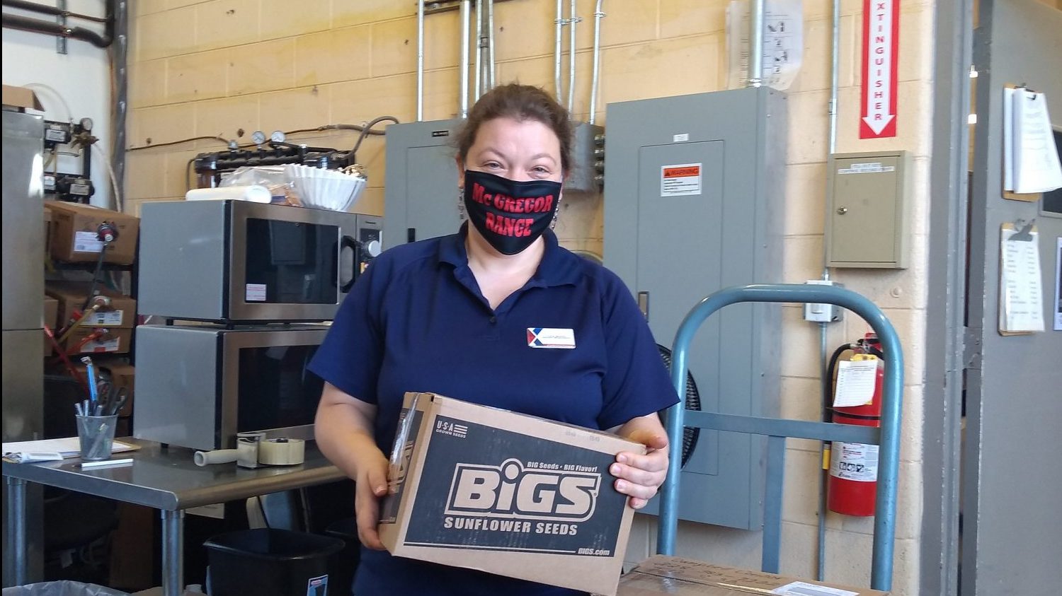 McGregor Range Troop Store Manager Tina Bretz prepares orders placed by quarantined troops through the Fort Bliss Exchange's personal shopper program.