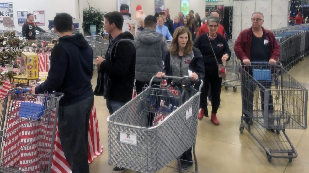 Shoppers at the Little Rock AFB Exchange on Black Friday 2019.. After a quieter 2020, stores are expecting a return to larger crowds in 2021,