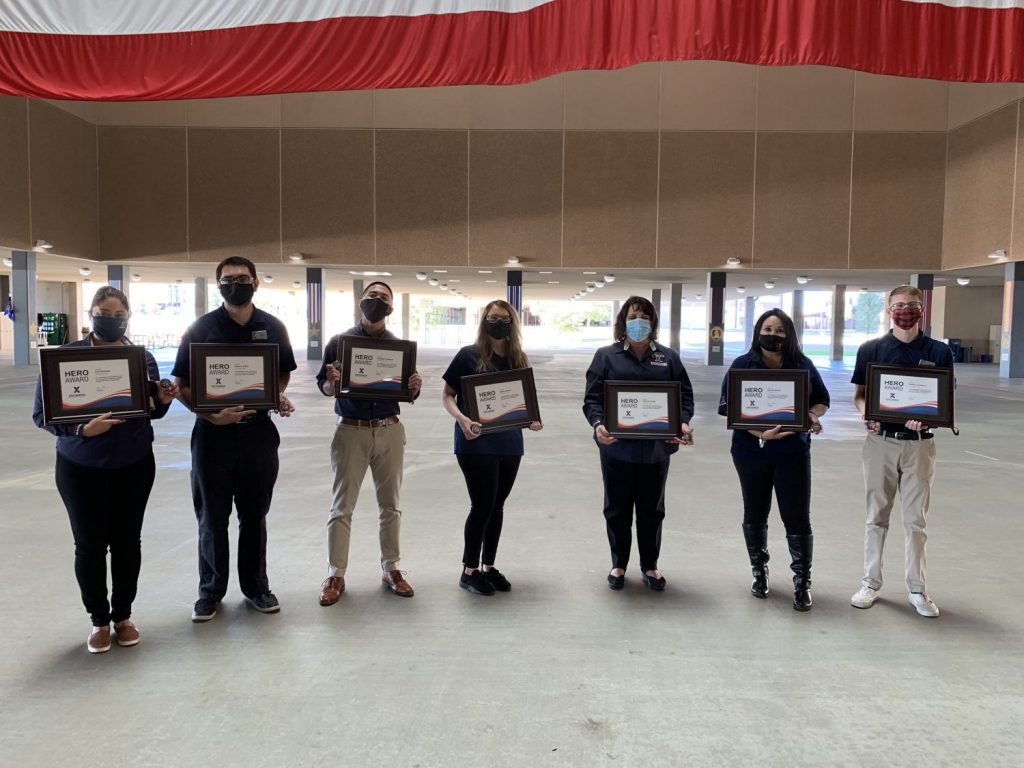 Joint Base San Antonio Exchange associates from the Lackland BMT Reception store receive Hero Awards.