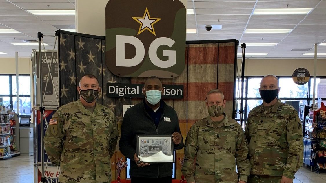 From left, Col. Michael Poss, Fort McCoy Garrison Commander; Donald Basil, PX general manager; Command Sgt. Maj. Paul Mantha; and Deputy Garrison Commander  Lt Col. Alex Carter,