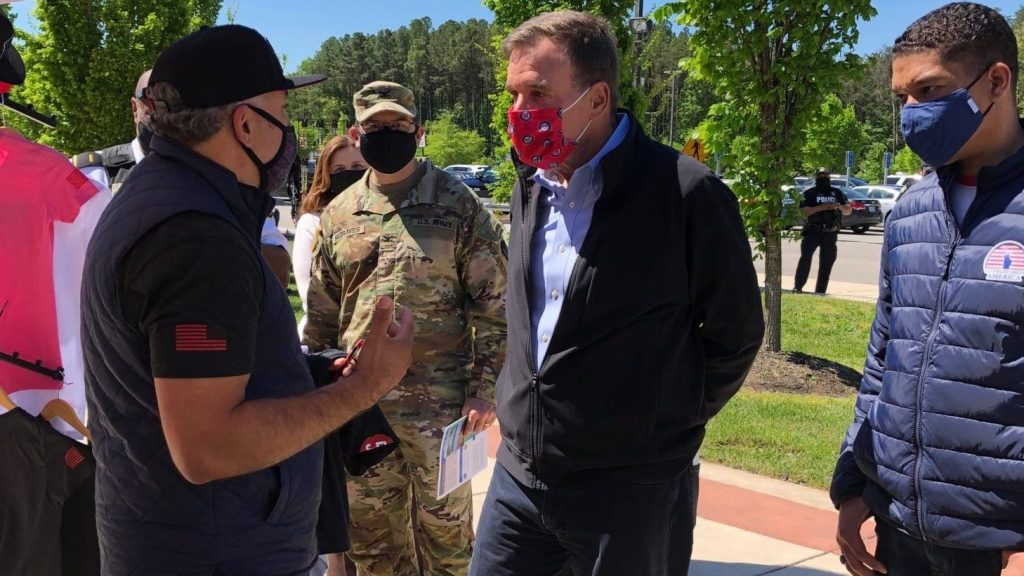 The Veteran Business Expo at the Fort Belvoir Exchange attracted Virginia Sen. Mark Warner, who visited with vendors at the event for businesses owned by Veterans and military spouses. Garrison Commander Col. Joshua SeGraves, in background, also spoke with vendors.