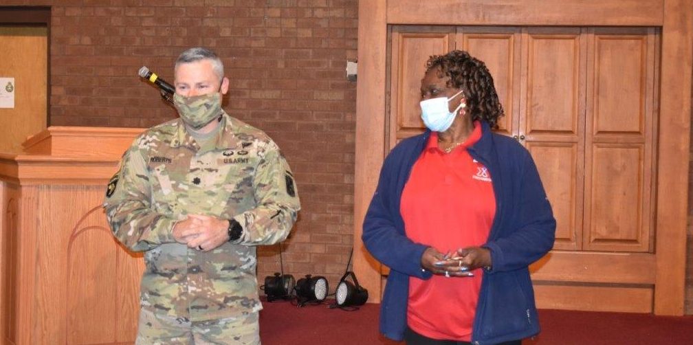 Rosa Bell with LTC Cory Roberts, commander of the 1st Battalion, 19th Regiment at Fort Benning, which held a retirement presentation for Bell on May 17. Her Exchange retirement ceremony is scheduled for May 27