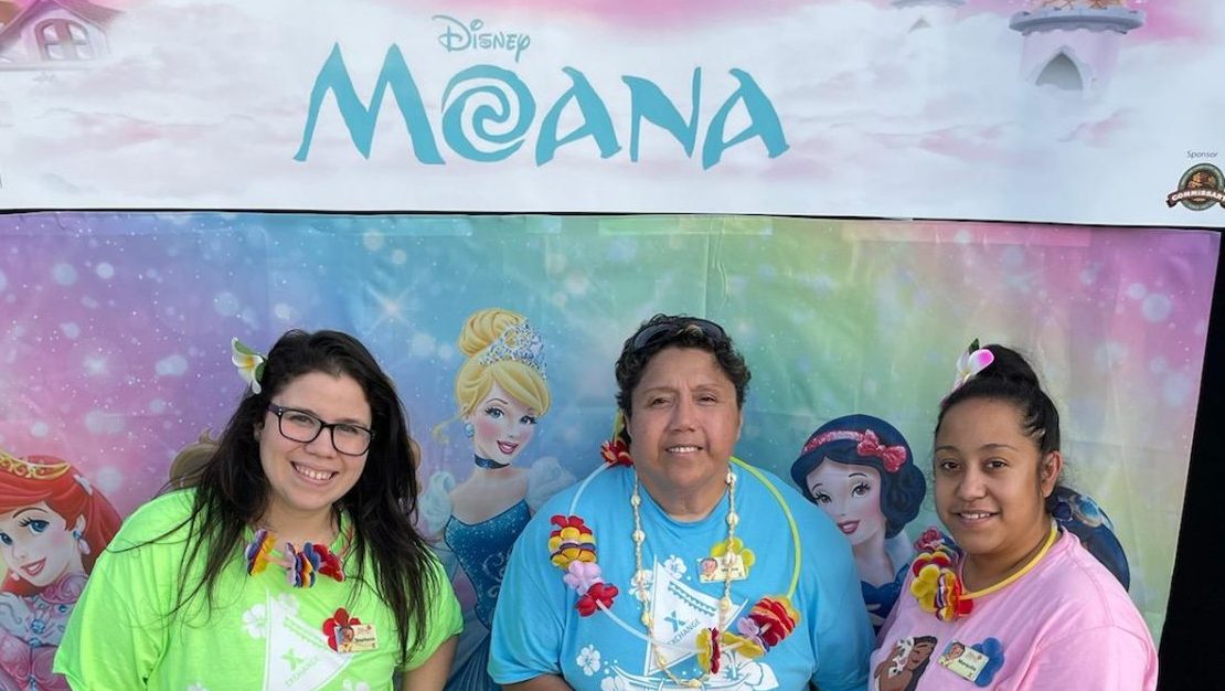 From left to right:  Stephanie Rivera (Customer Experience teller), Marina Lemanua (assistant store manager) and Marquita Herrera (visual merchandiser) get in the spirit at Fort Leavenworth's screening of Disney's "Moana."