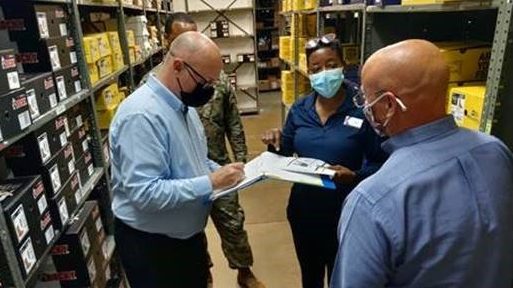 During a visit to the Fort Sam Houston Exchange this year, COO stops by the Military Clothing Store and confers with manager Tonya Yancey.