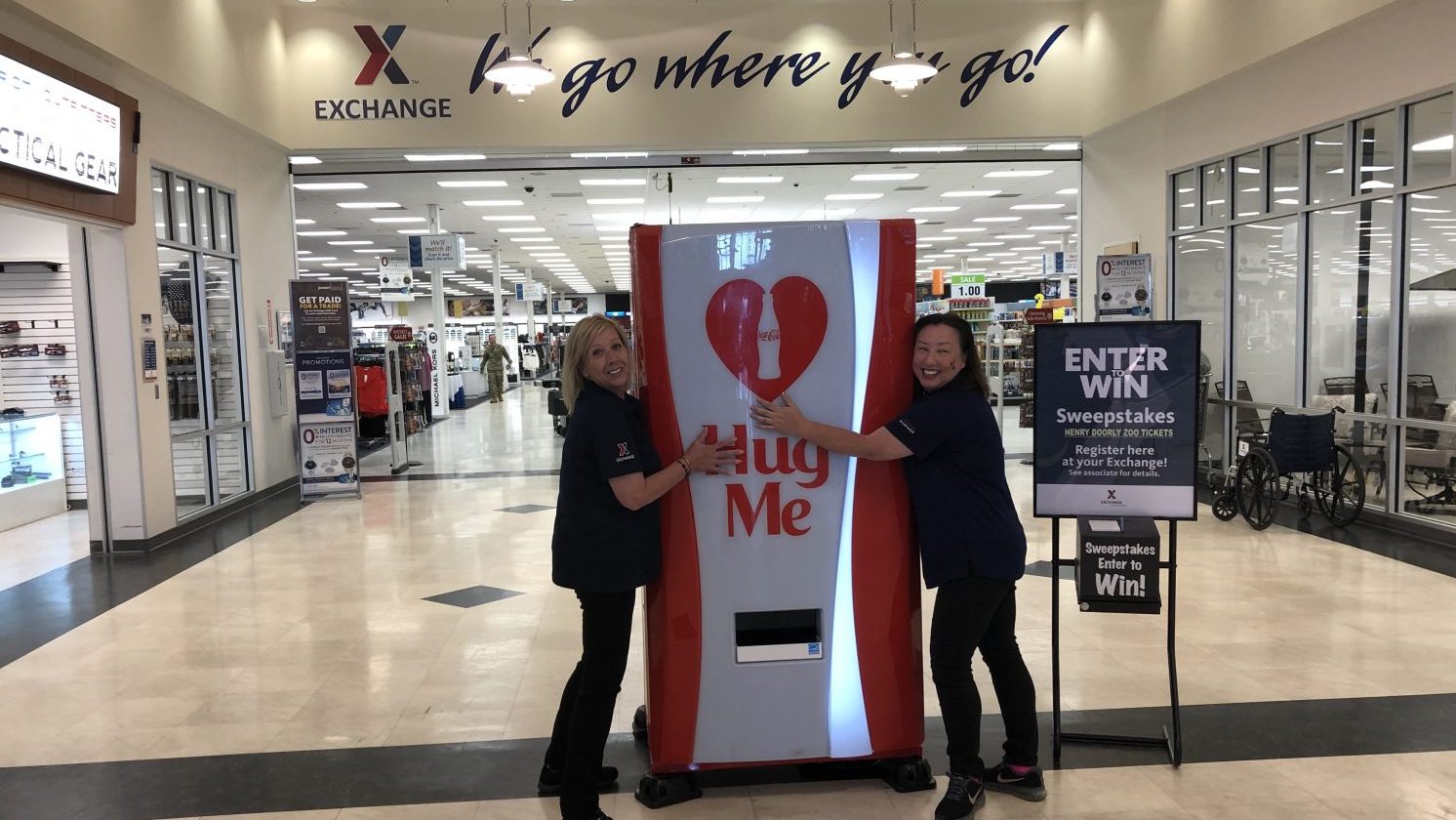 Patricia Griffin, main store manager (left) and Elaine Loos, assistant store manager, set up a display for an Exchange event at Offut Air Force Base. 
Griffin has served those who serve at the Exchange for more than 28 years.
