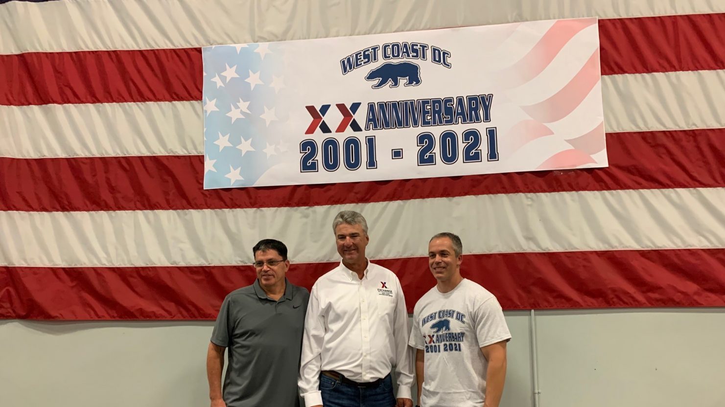 Mike Martino, right, the current manager of the West Coast Distribution Center, with former managers Kent Altom, left, and Peter Catineau. Altom retired in early 2021 and Catineau retired in 2015.