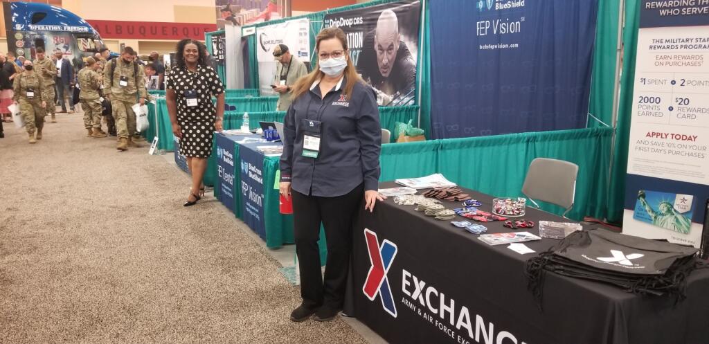 Nancy Comesanas, the Kirtland Air Force Base Exchange's sales & merchandise manager, at the Exchange's table during the EANGUS conference in Albuquerque.