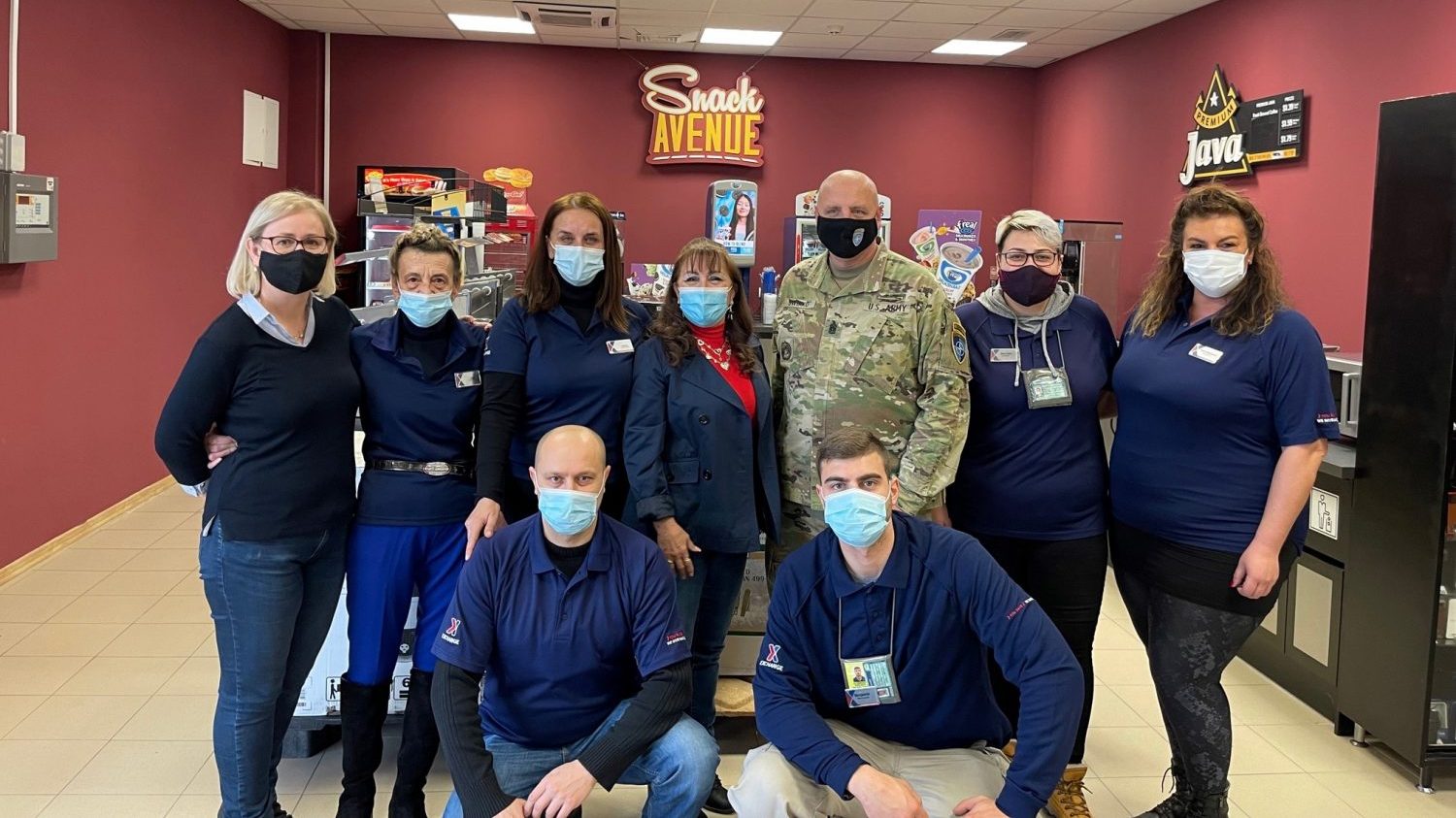 Camp Butmir associates received recognition from NATO HQ Command Sgt. Maj. Francis Swirko for their efforts in reopening the store after a flood.
Back row left to right: FA Field Accountant Lejla Huric, Sales Associate Zijada Muminovic, Store Manager Halima Avdic, Balkans/Turkey General Manager Pini Duverney, NATO HQ Command Sgt. Maj. Francis Swirko, Sales Associate Nina Cehic and Supervisor Najra Hajdarevic
Bottom row left to right: Assistant Manager Emin Softic and Sales Associate Benjamin Elkaz 

