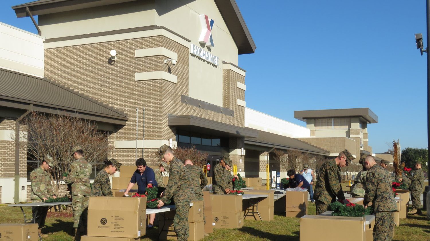 The scene at the Keesler BX during Military Day, when volunteers and associates prepare wreaths for Wreaths for Biloxi National Cemetery.