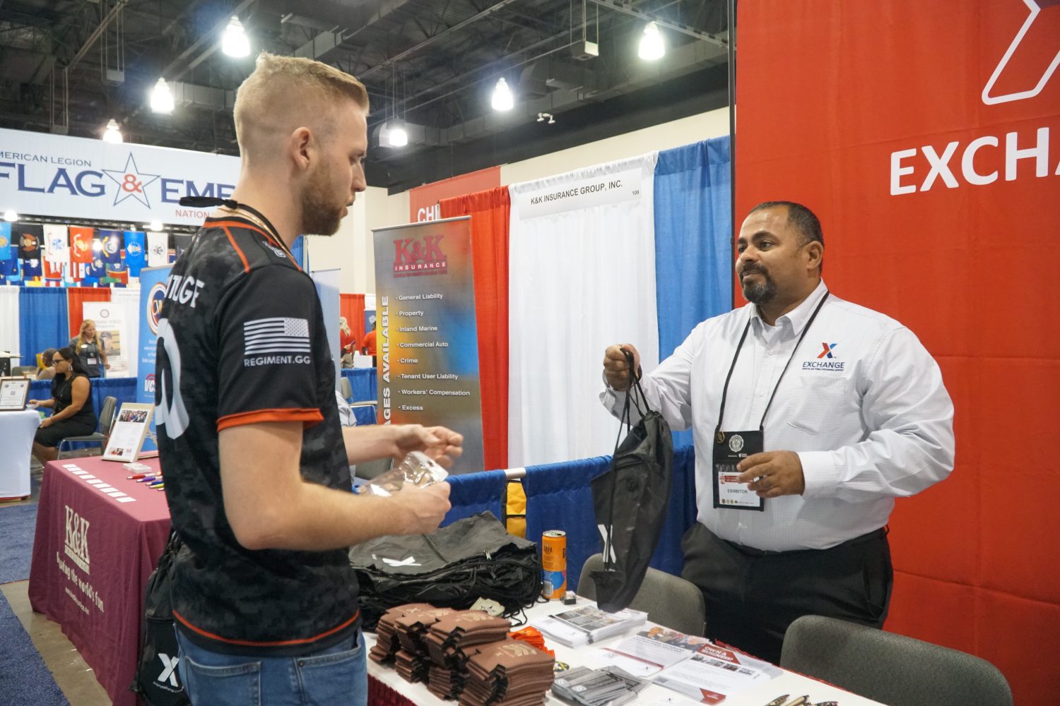 <b>Hernandez tells a Veteran about Exchange benefits at the American Legion’s 103rd National Convention in Milwaukee.</b>