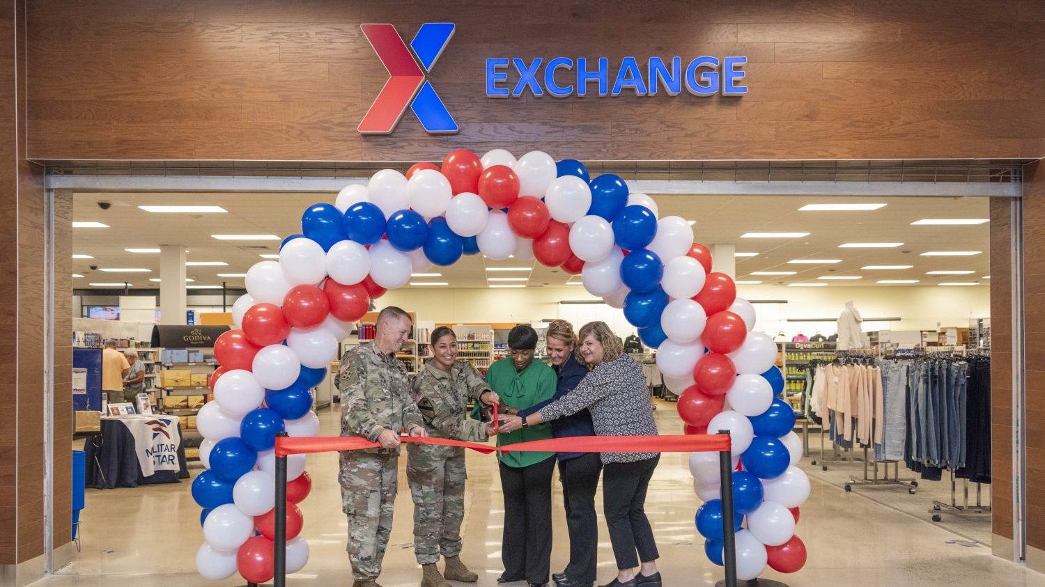 <B>From left, U.S. Army War College Commandant Maj. Gen. David Hill, Carlisle Barracks Garrison Commander Lt. Col. Jeannette Molina, Carlisle Barracks Exchange General Manager Valerie Bright, Department Manager Melanie Morrison and Exchange Northeast Region Vice President Amanda Hartfield cut the ribbon on the Carlisle Barracks Exchange's $5.2 million renovation Sept. 19. (Photo by USAG Carlisle Barracks Public Affairs Officer Curtis Keester)</B>