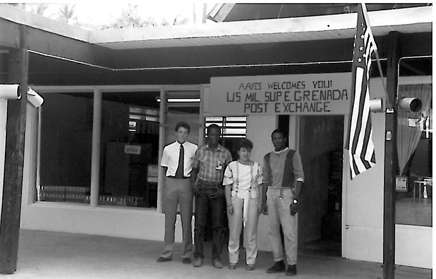 <b>The staff of the two-room Exchange at Grand Anse Beach in Grenada in 1983. At left is manager Ricky Byrd, who began his Exchange career in 1982 and retired in 2013, when he was general manager of JBER Elmendorf/Southern Alaska Exchange. The other three people pictured were local nationals who worked at the store.</b>
