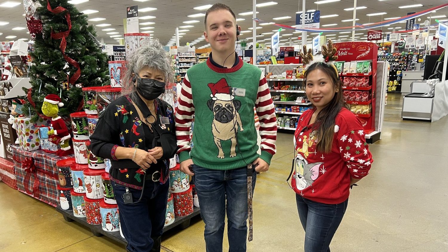 <b>Little Rock Air Force Base Exchange associates Rita McCray, Andrew Lang and Noralynn Cook get festive for Black Friday.