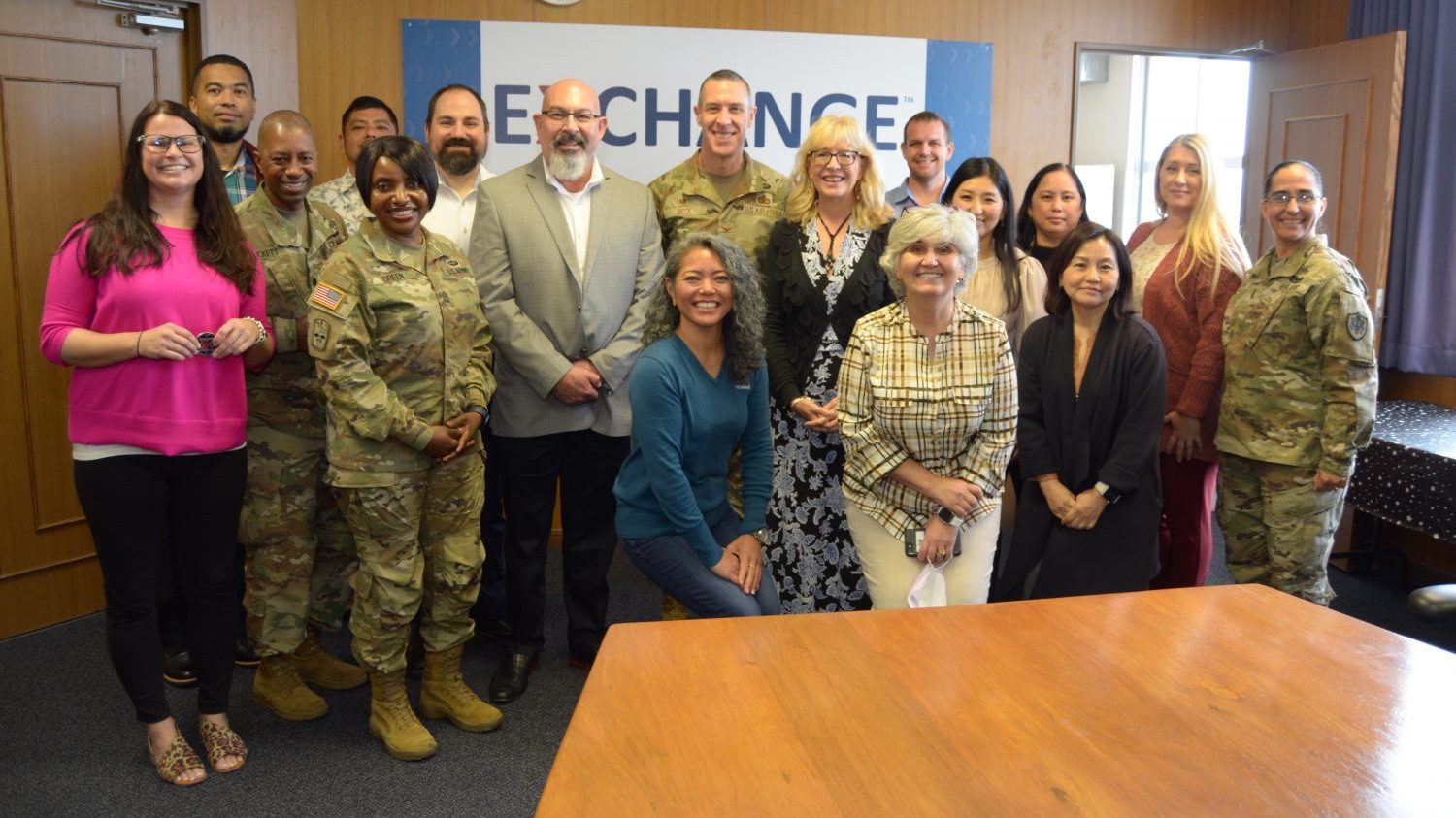 Pacific Region Senior Vice President Karin Duncan, surrounded by her team.