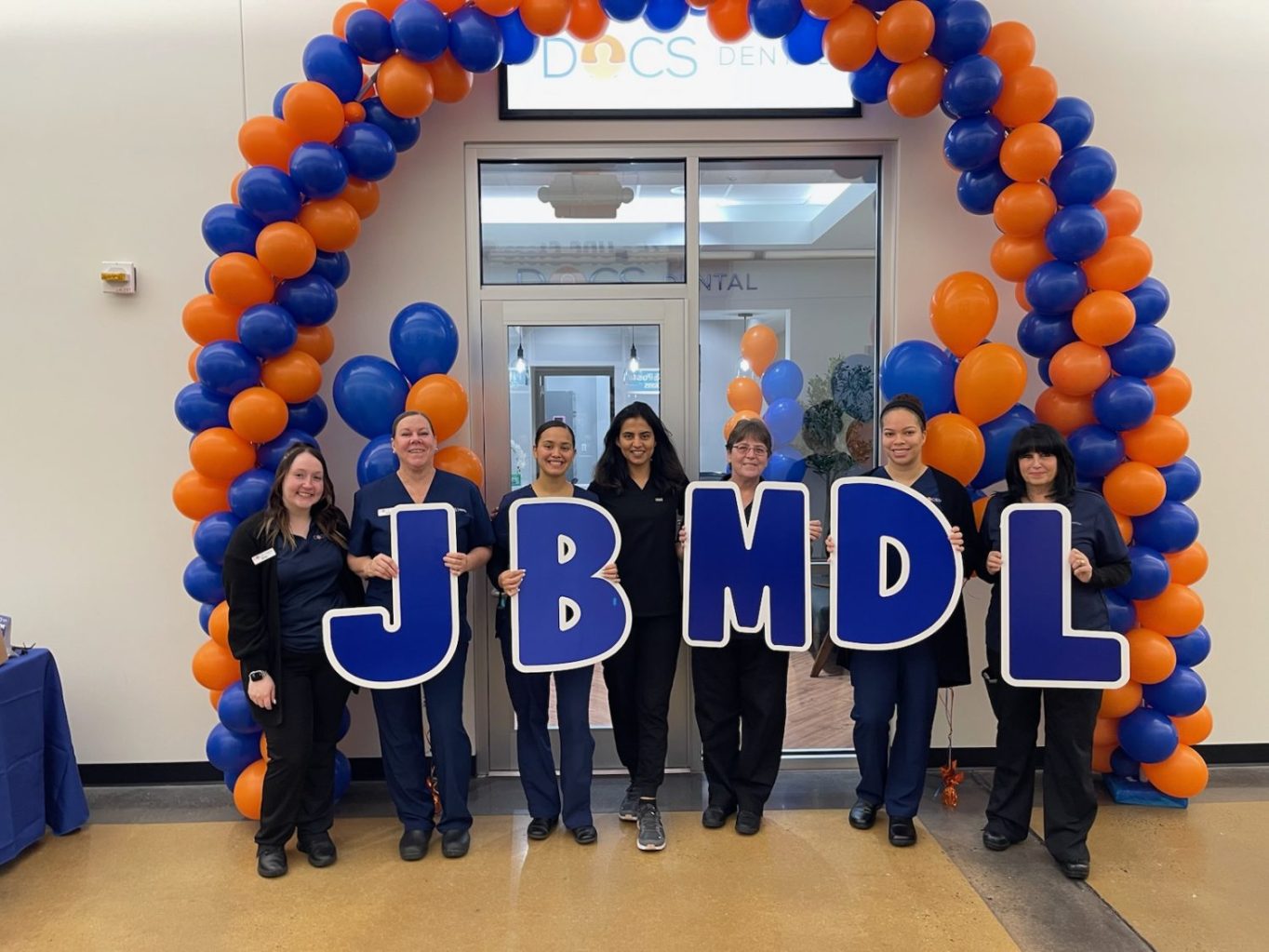 <b>From left: Nicole Newsome office manager, Claudia Baron, dental assistant, Chaely Corneil dental assistant,
Dr. Bains dentist, Carol Brochon Member coordinator, Susan Boyd hygienist, Denise Manger member coordinator at the DOCS grand opening at Joint Base McGuire-Dix-Lakehurst.</b>
